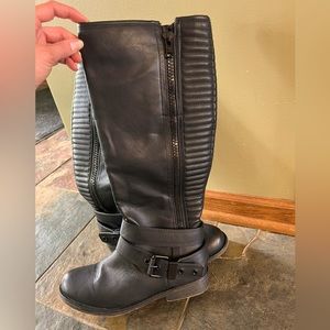 Woman’s tall black fashion boots